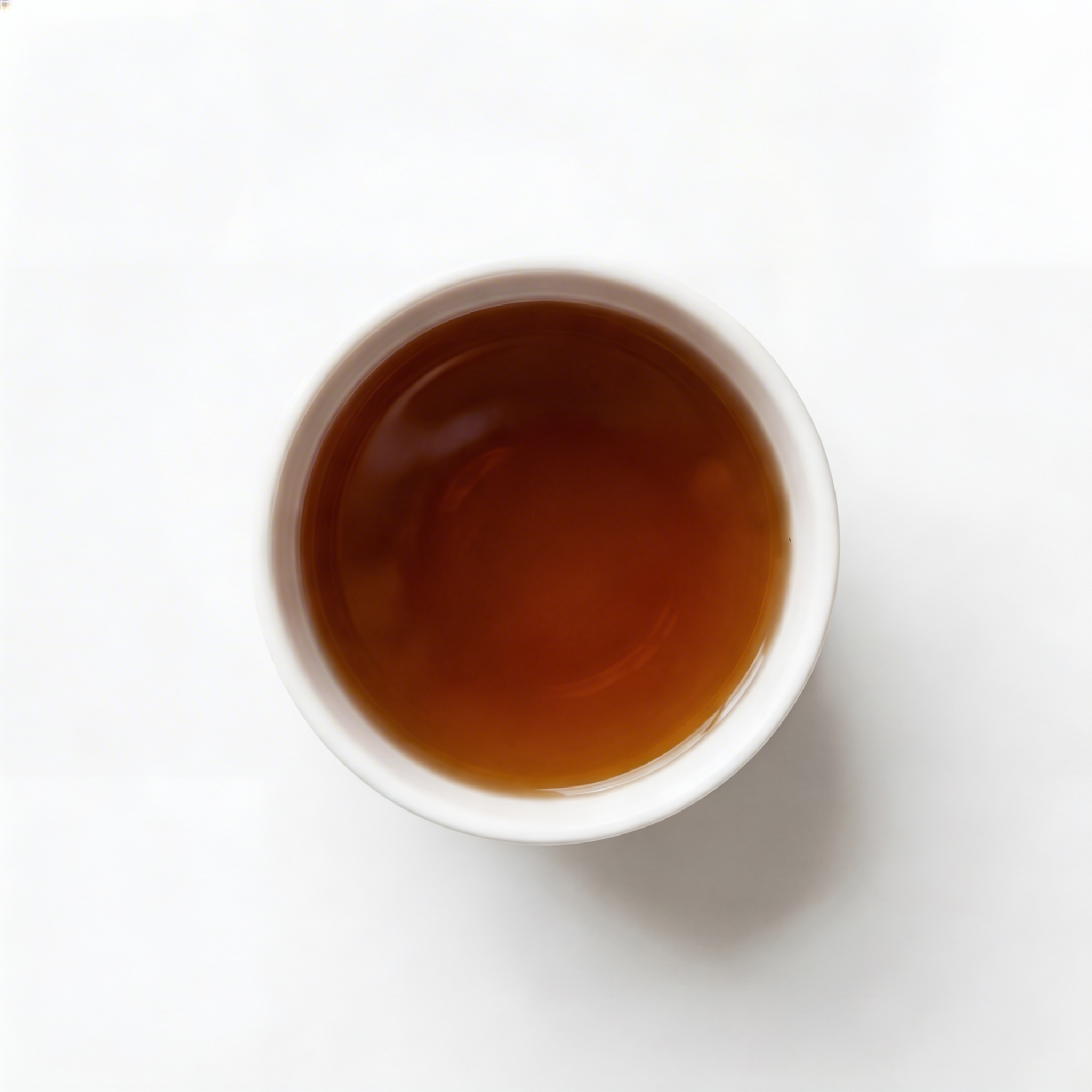 Hojicha Haven brewed in cup — rich amber organic roasted Japanese tea, low caffeine and calming