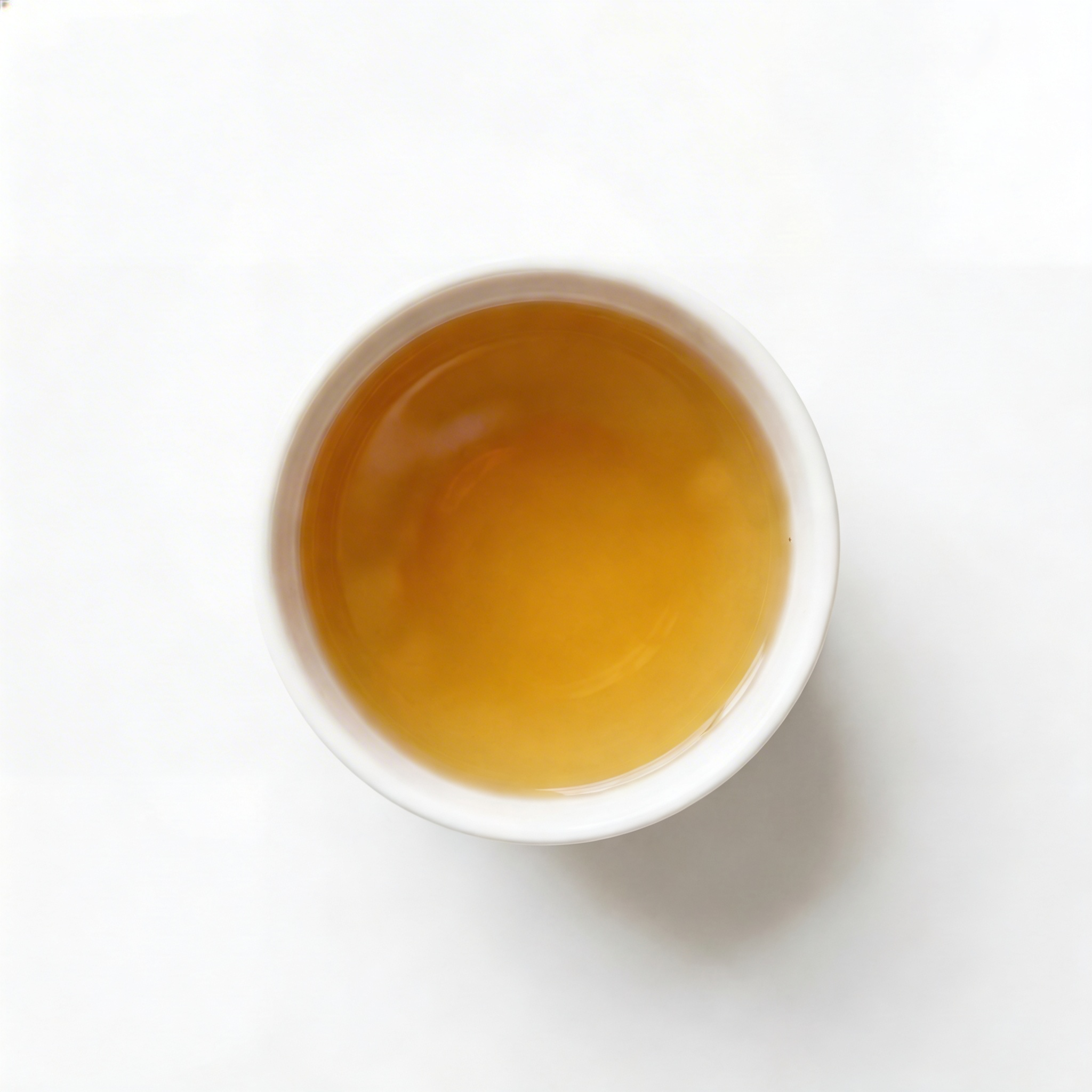 Kuwanoha Bliss brewed in cup — warm golden organic mulberry leaf sleep tea from Miyazaki Japan